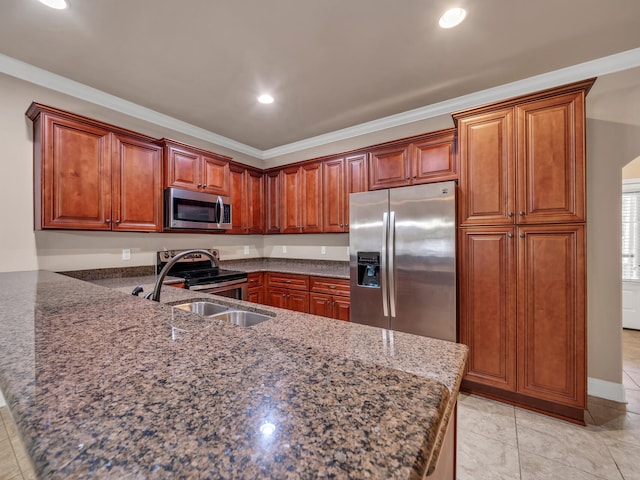 kitchen featuring dark stone counters, sink, crown molding, appliances with stainless steel finishes, and light tile patterned flooring