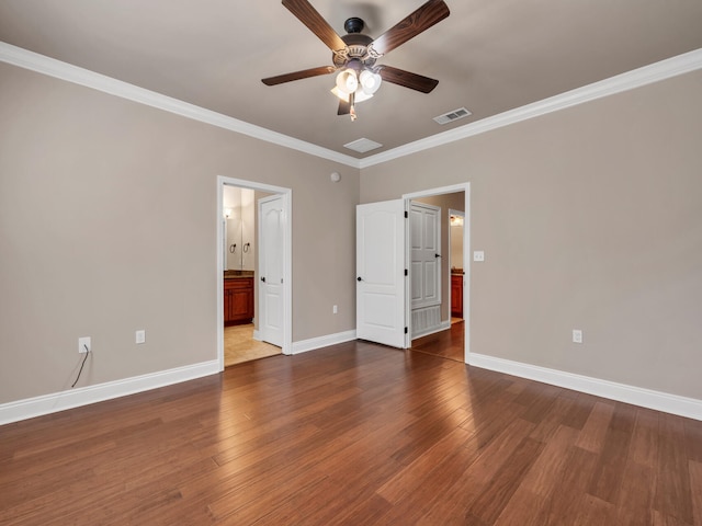 unfurnished bedroom featuring wood-type flooring, connected bathroom, ceiling fan, and ornamental molding