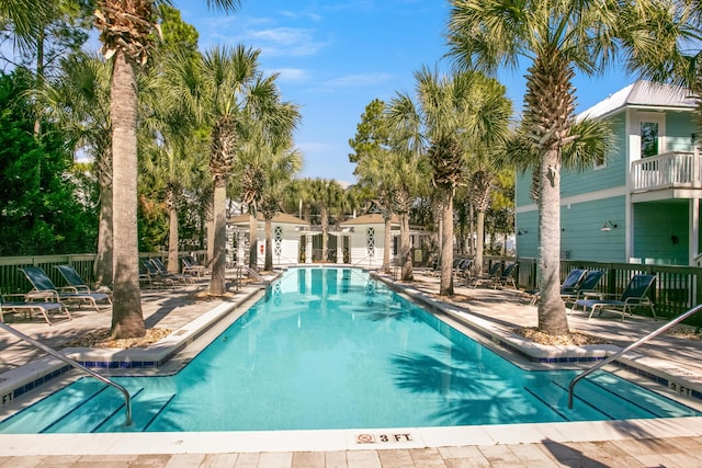 view of swimming pool featuring a patio