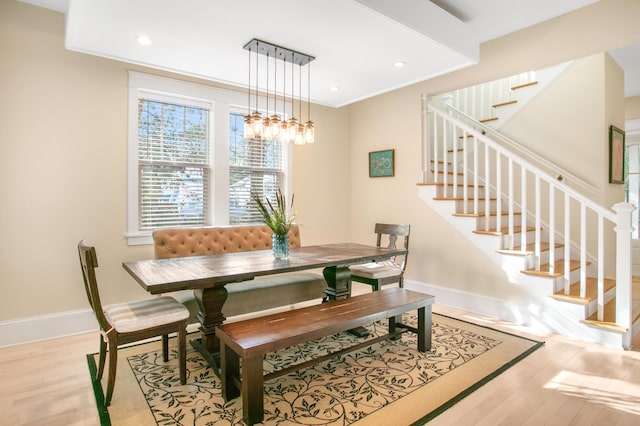 dining area with light hardwood / wood-style floors