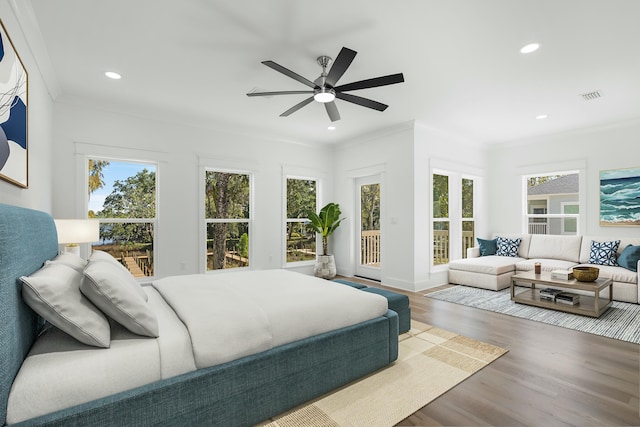 bedroom featuring wood-type flooring, access to outside, ceiling fan, and crown molding