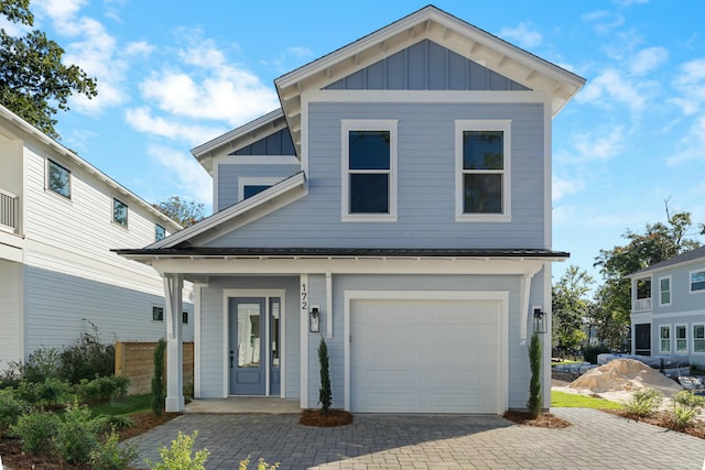 view of front of property featuring a garage