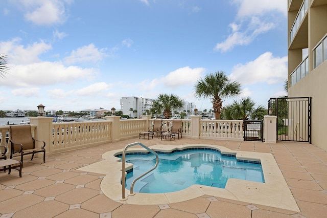 view of swimming pool with a patio area