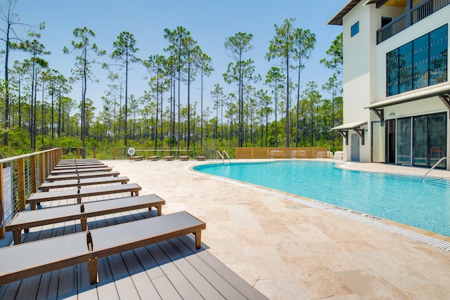 view of pool with a patio