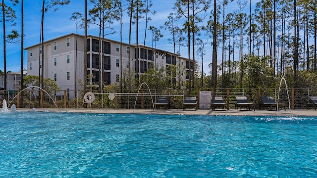 view of pool featuring pool water feature