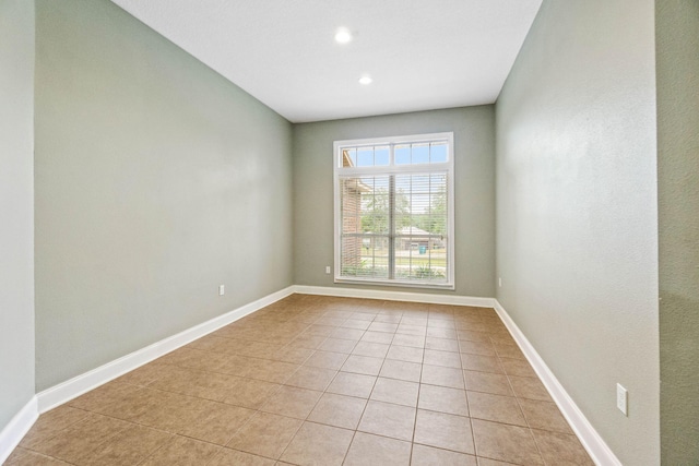 view of tiled spare room