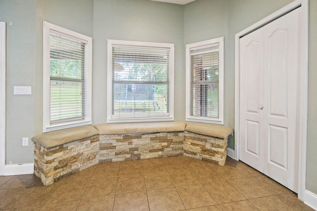 interior space with light tile patterned floors