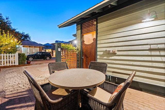 wooden deck with a patio