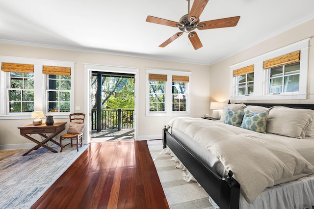 bedroom featuring hardwood / wood-style floors, ceiling fan, ornamental molding, and access to outside