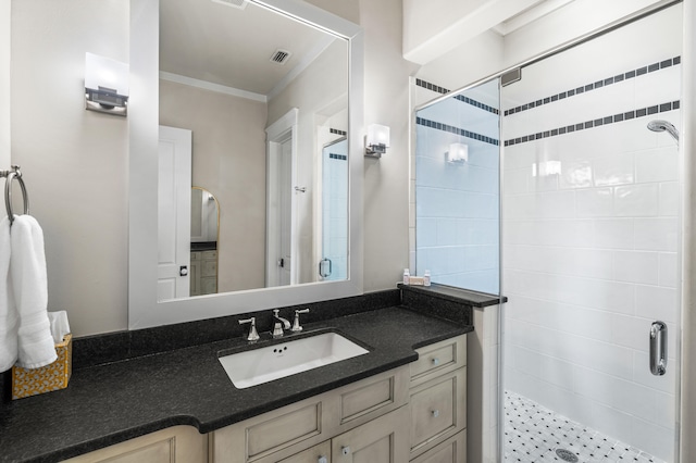 bathroom featuring vanity, walk in shower, and crown molding