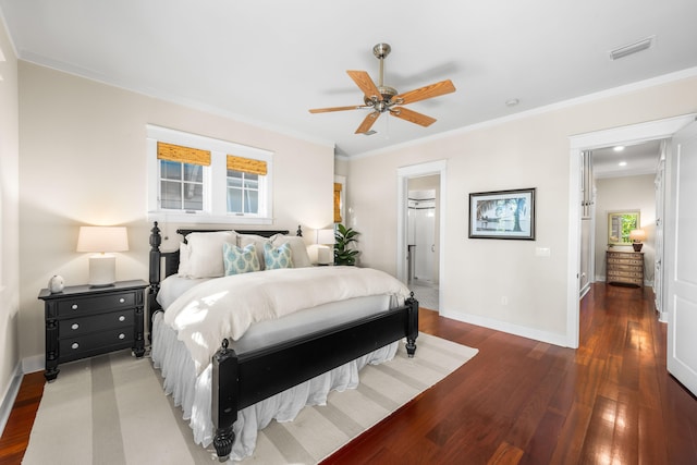 bedroom featuring dark hardwood / wood-style floors, ceiling fan, and ornamental molding