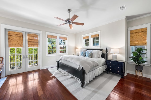 bedroom featuring ceiling fan, dark hardwood / wood-style floors, access to exterior, and crown molding