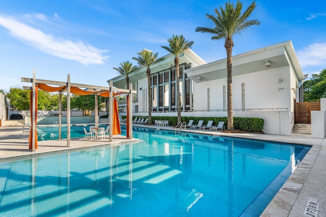 view of swimming pool featuring a patio