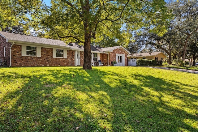 ranch-style house with a front yard