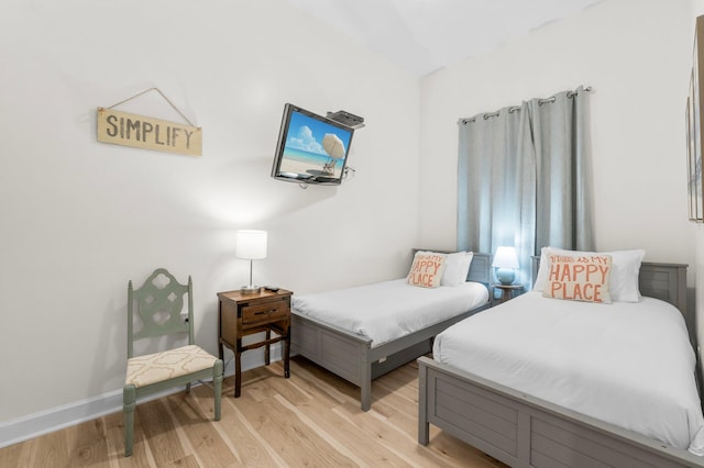 bedroom featuring light hardwood / wood-style floors