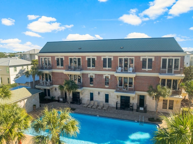 view of pool with a patio