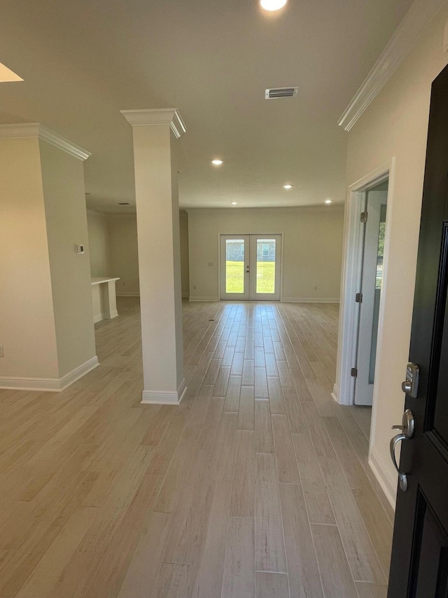 836 Coastal Breeze Dr, Freeport, FL 32439 - spare room featuring ornamental molding, baseboards, light wood-style flooring, recessed lighting, and french doors