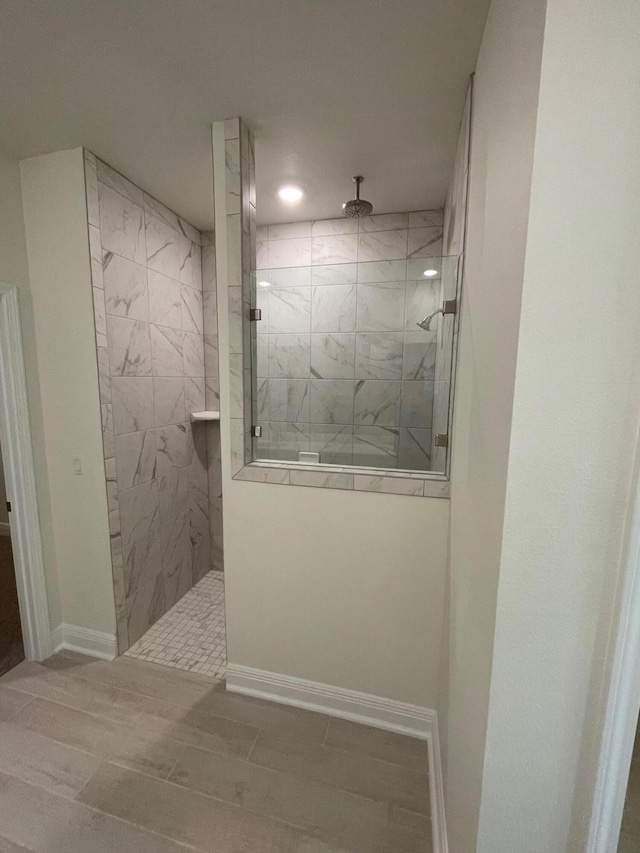 836 Coastal Breeze Dr, Freeport, FL 32439 - full bathroom featuring a walk in shower, baseboards, wood finished floors, and recessed lighting