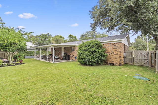 view of yard with a patio