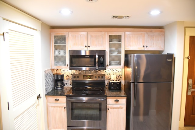 9200 Baytowne Wharf Blvd Unit 444/446, Miramar Beach, FL 32550 - kitchen featuring stainless steel appliances, light brown cabinets, backsplash, glass insert cabinets, and recessed lighting