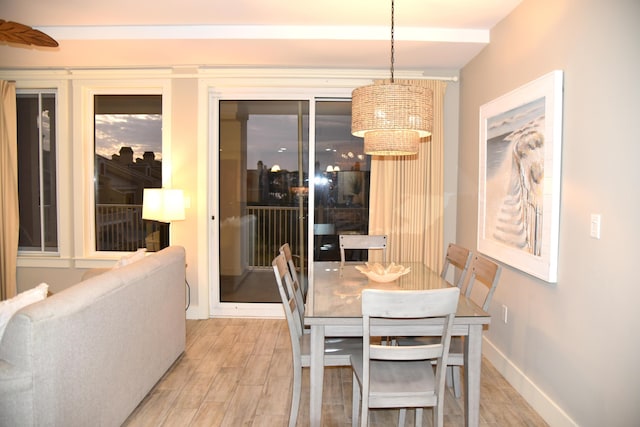 9200 Baytowne Wharf Blvd Unit 444/446, Miramar Beach, FL 32550 - dining space featuring light wood finished floors and baseboards