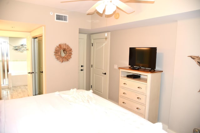 9200 Baytowne Wharf Blvd Unit 444/446, Miramar Beach, FL 32550 - bedroom with a ceiling fan and wood finished floors