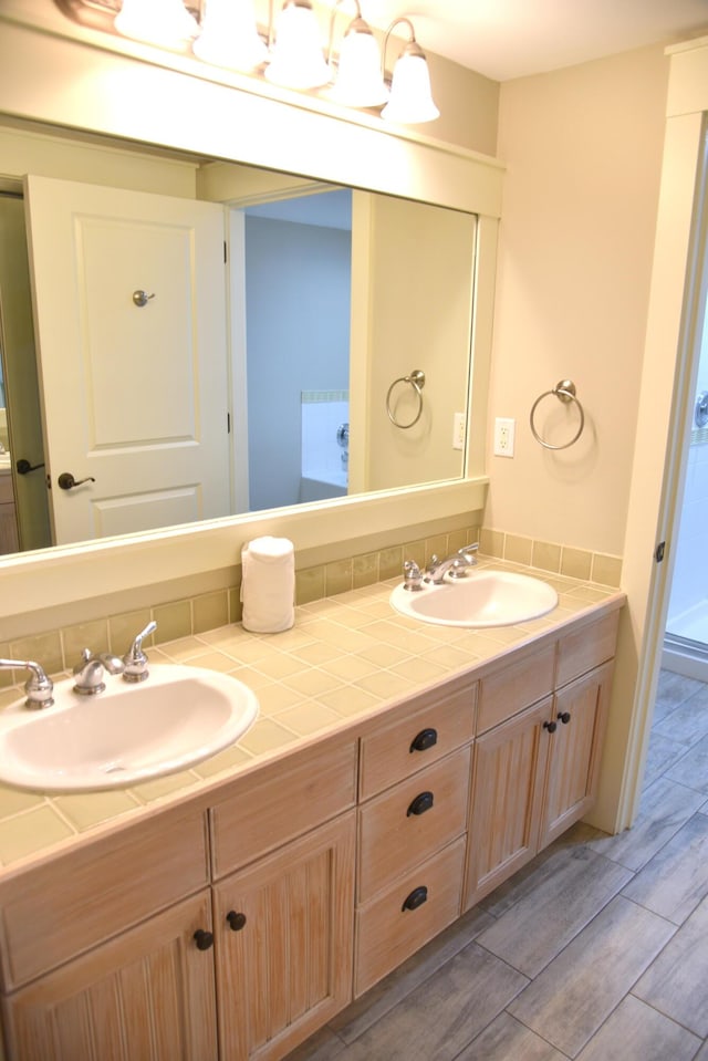 9200 Baytowne Wharf Blvd Unit 444/446, Miramar Beach, FL 32550 - full bathroom featuring wood finish floors and double vanity