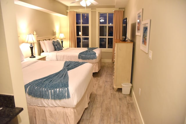 9200 Baytowne Wharf Blvd Unit 444/446, Miramar Beach, FL 32550 - bedroom featuring light wood-style floors and baseboards