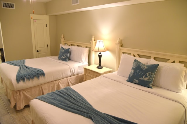 bedroom featuring hardwood / wood-style floors