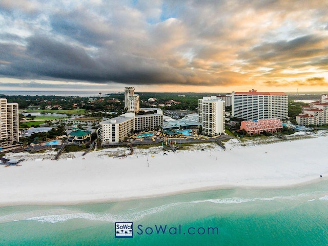 9200 Baytowne Wharf Blvd Unit 444/446, Miramar Beach, FL 32550 - aerial view at dusk of view of water and beach and a city view