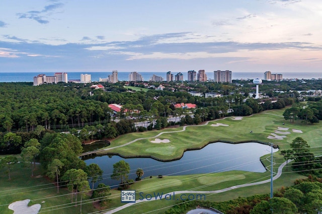 aerial view at dusk with a water view