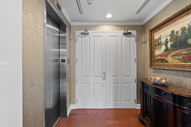 hall with crown molding, dark wood-style flooring, baseboards, and elevator