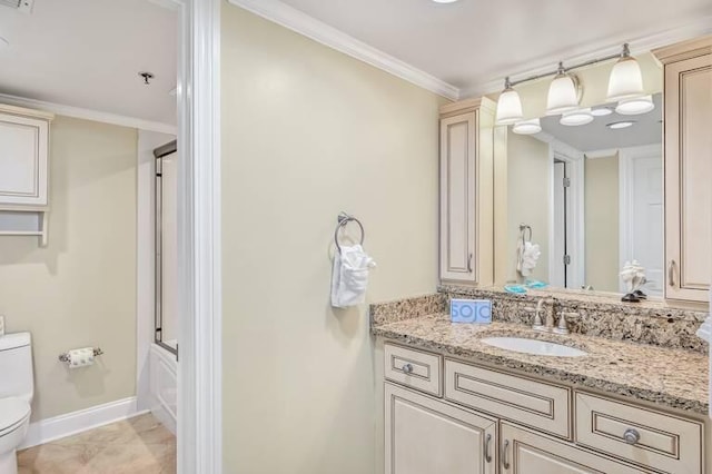 full bathroom with ornamental molding, vanity, shower / bath combination with glass door, tile patterned flooring, and toilet