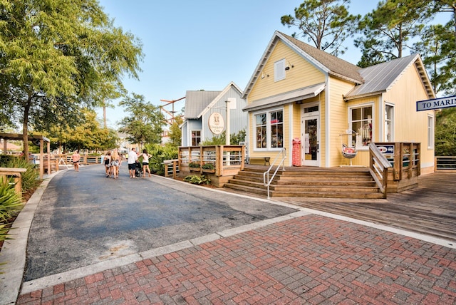 view of front of house with a wooden deck