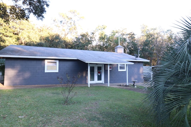 ranch-style home with a front yard