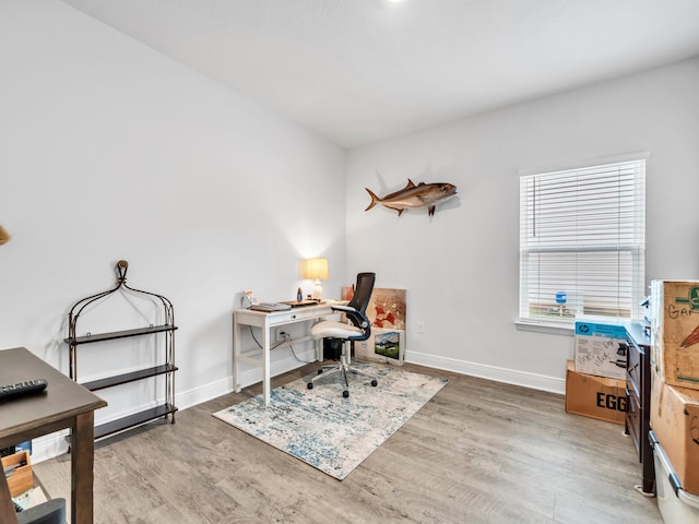 office area with wood-type flooring