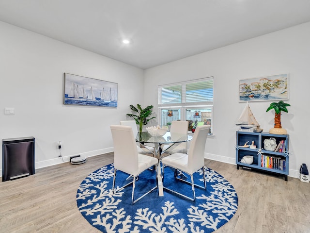 131 W Oak Trees Ln, Freeport, FL 32439 - dining area with baseboards, wood finished floors, and recessed lighting
