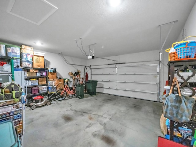 garage featuring a garage door opener