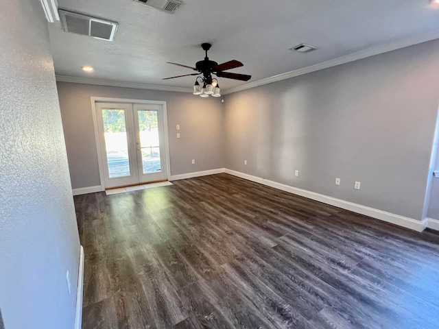 unfurnished room with ornamental molding, french doors, ceiling fan, and dark wood-type flooring