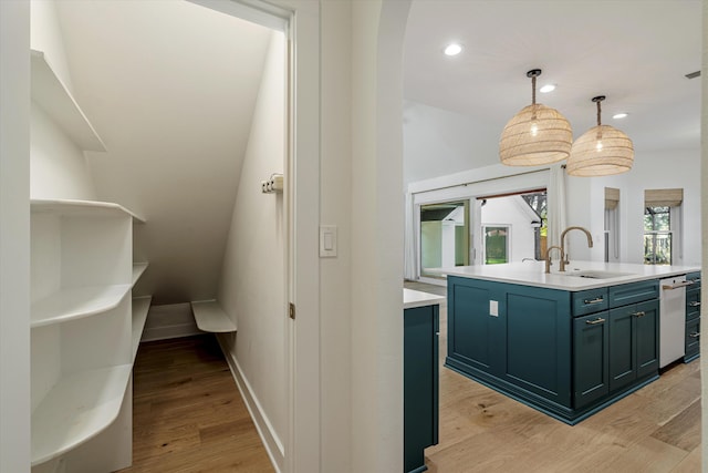 interior space with vanity, vaulted ceiling, and hardwood / wood-style flooring