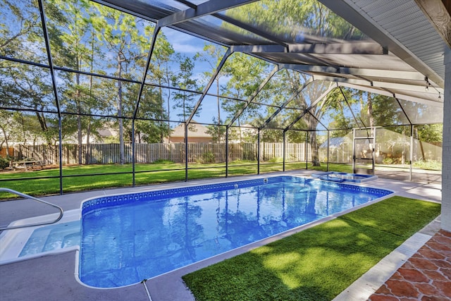 view of pool featuring a lanai, a jacuzzi, a patio, and a lawn