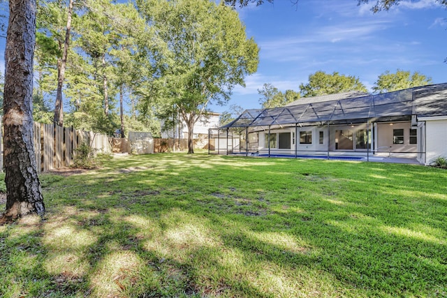 view of yard featuring a lanai