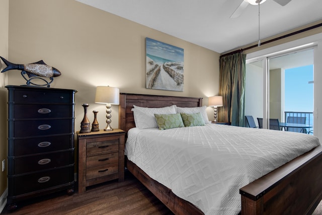 bedroom with ceiling fan and dark wood-type flooring