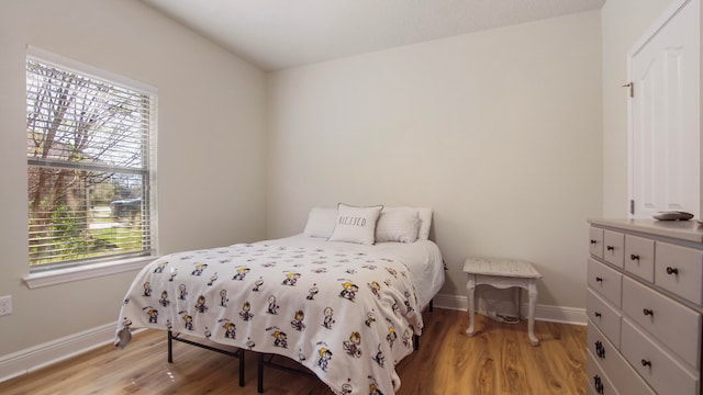 bedroom featuring light hardwood / wood-style floors