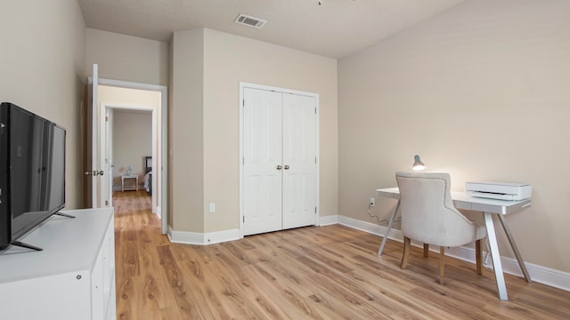 office space featuring light wood-type flooring