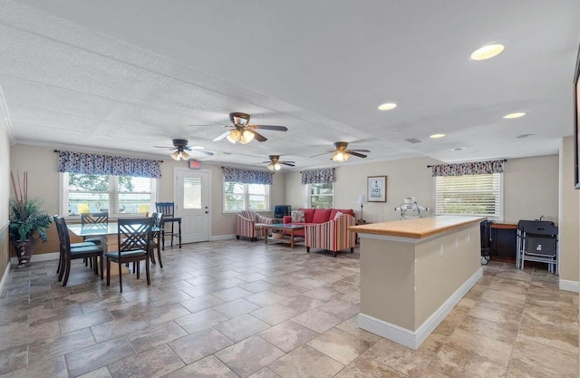 kitchen featuring ceiling fan