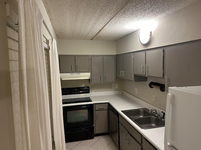 kitchen featuring sink, black electric range, stainless steel dishwasher, fridge, and light tile patterned flooring