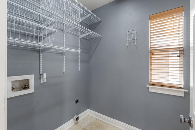 laundry room with washer hookup and hookup for an electric dryer