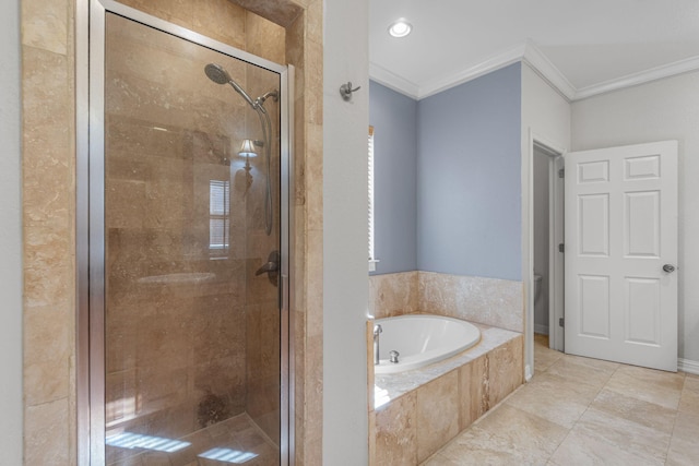 bathroom featuring crown molding and plus walk in shower