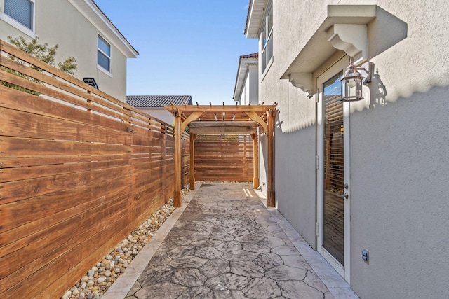 view of patio / terrace featuring a pergola